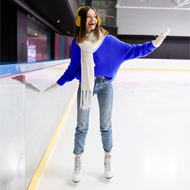 Woman skating on a rink