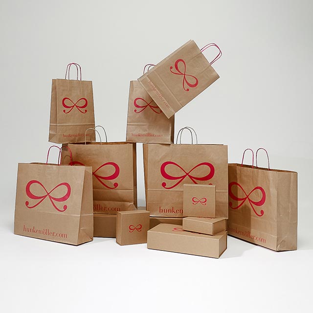 Pany paper bags with a Hunkemoller's logo